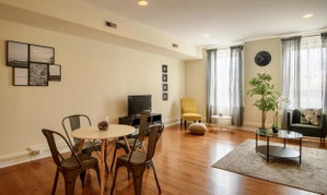 HUGE 4 BEDROOM W/FREE STREET PARKING LOCATED DIRECTLY ON MAIN STREET